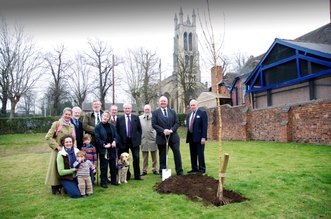 Members of the Woodward and Brinton Families plant a tree during the visit by HRH The Duke of Kent to St. George's Park, Kidderminster